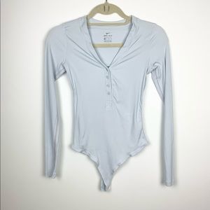 Nike Yoga Luxe Infinalon Dri-Fit Henley Bodysuit